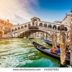 stock-photo-panoramic-view-of-famous-canal-grande-from-famous-rialto-bridge-at-sunset-in-venice-italy-with-245507692