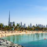 Beach,In,Dubai,With,People,And,Skyscapers,In,The,Background